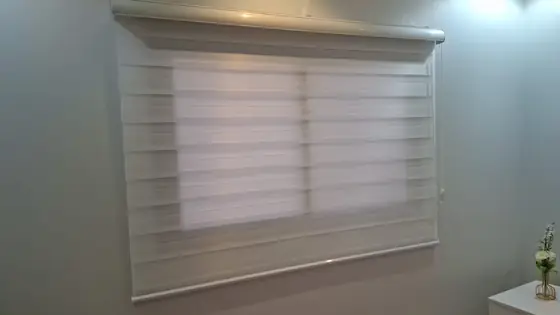 Roman blind in a bay window