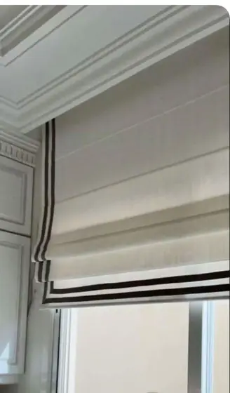 Wooden venetian blind installed in a living room