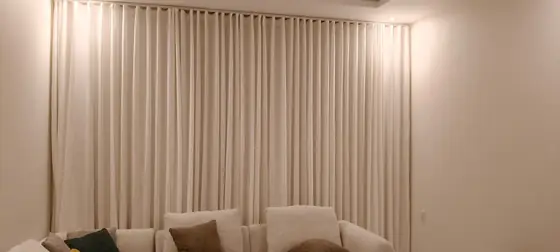 Tied-back curtains with a sheer under-layer