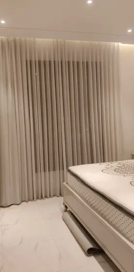Double-layer sheer and blackout curtains