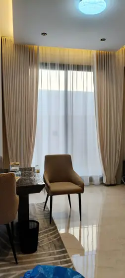Double-layer sheer and blackout curtains