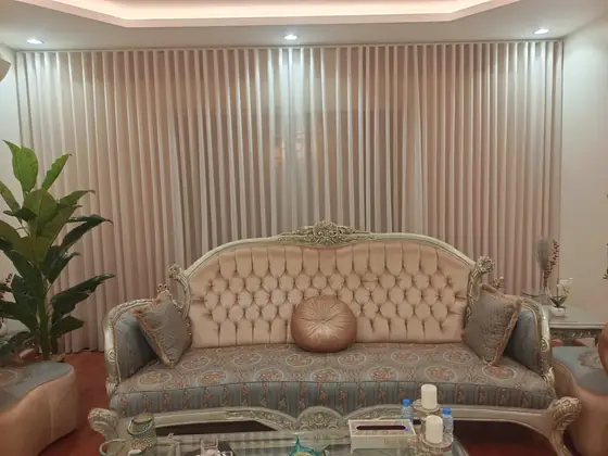 Floor-to-ceiling sheer curtains in a Riyadh majlis