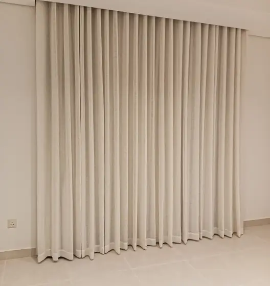 Tied-back curtains with a sheer under-layer