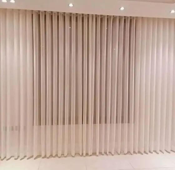 Swag curtains with tiebacks in a formal reception room