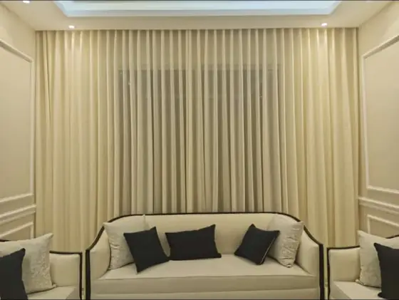 Swag curtains with tiebacks in a formal reception room