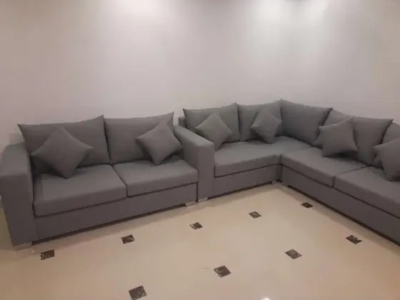 Corner sofa reupholstered in our Riyadh workshop